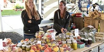 table of vegetables at farmers market on campus