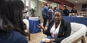 graduate students attending opening of grad student lounge reception