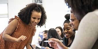 instructor coaching students during class